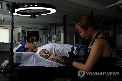 34년 만의 반전! 대법원, 문신 합법화 '전원일치' 선언
